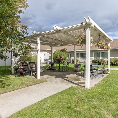 A covered patio outside of Richland post Acute